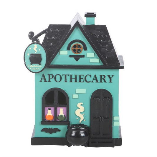 Apothecary shop LED light up decoration with eerie details and vibrant colors for Halloween displays.