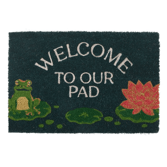 Doormat with 'Welcome to our pad' text, frog, and lily pad design on a white background