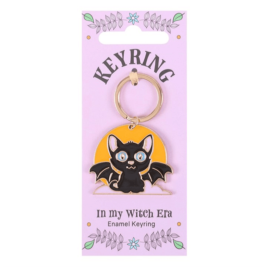 Keyring with bat design on a purple card with text
