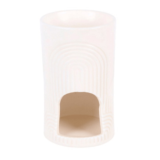 Embossed arch wax warmer in soft cream ceramic finish, perfect for home fragrance and stylish decor.