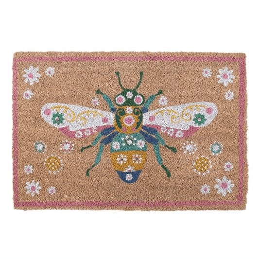 Doormat with bee design and floral patterns on a white background