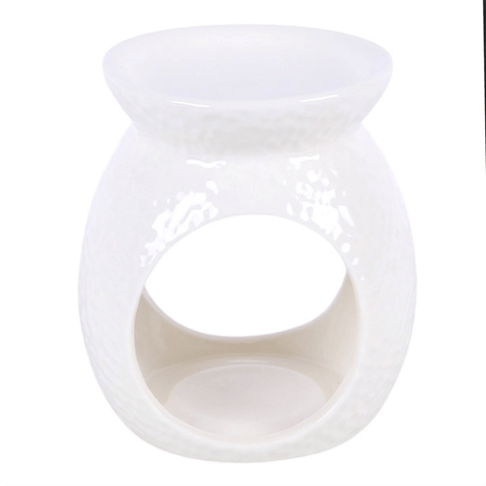 Dimpled Oil Burner and Wax Warmer in glossy white ceramic, perfect for home fragrance enthusiasts and stylish decor.