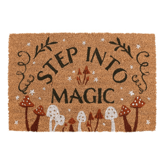 Doormat with 'Step into Magic' text and mushroom design on a white background