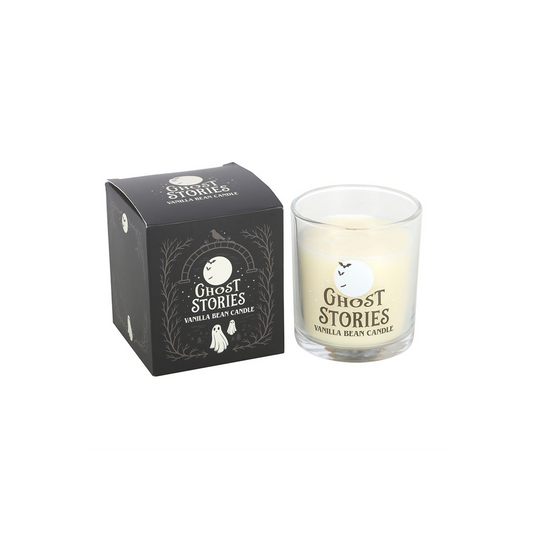 Ghost Stories Vanilla Bean Candle in a glass jar next to its black box, perfect for cozy evenings.