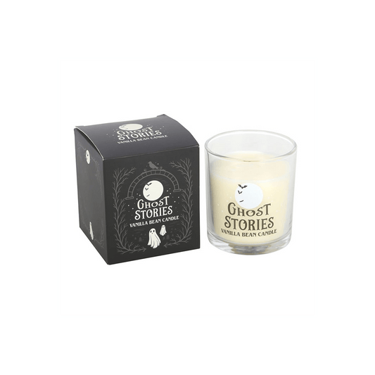 Ghost Stories Vanilla Bean Candle in a glass jar next to its black box, perfect for cozy evenings.