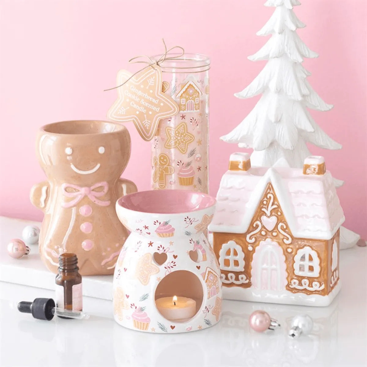 Pink Gingerbread Man Oil Burner and festive decor, perfect for cozy scents and Christmas gifting.