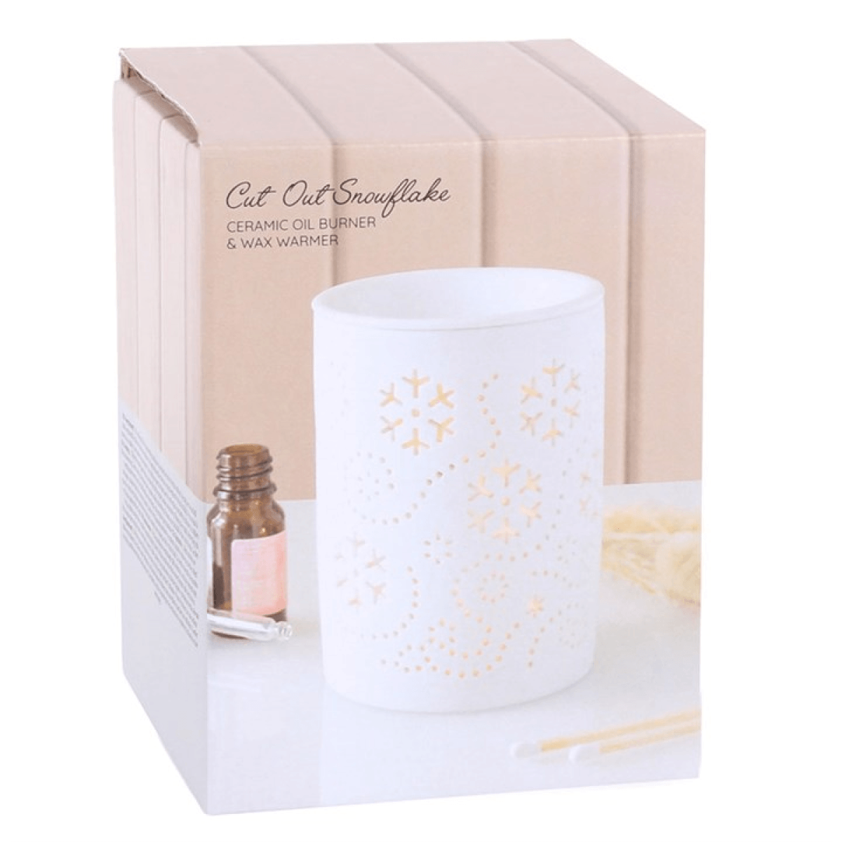 White snowflake cut out ceramic oil burner and Wax Warmer for seasonal home fragrance.