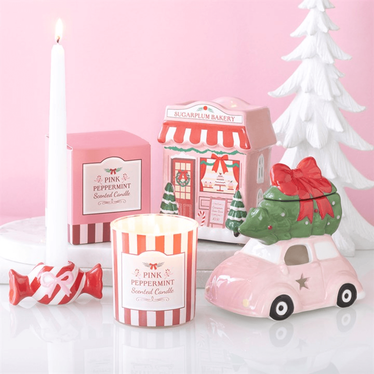 Charming Sugarplum Bakery oil burner with festive decor, ideal for cozy Christmas gifting and playful home ambiance.