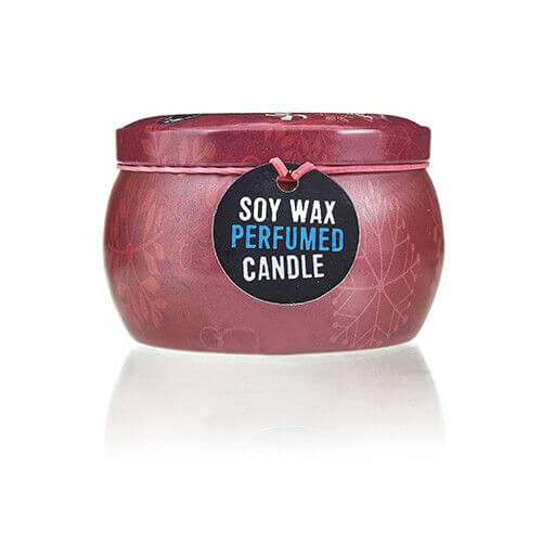 Art Tin Candle in a vintage design, with a tag saying Soy Wax Perfumed Candle, perfect for Christmas decor.