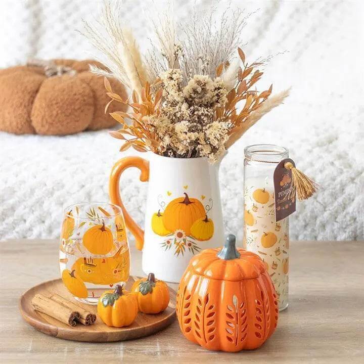 Autumn decor featuring an Autumn Pumpkin Ceramic Flower Jug with dried flowers and decorative pumpkins.