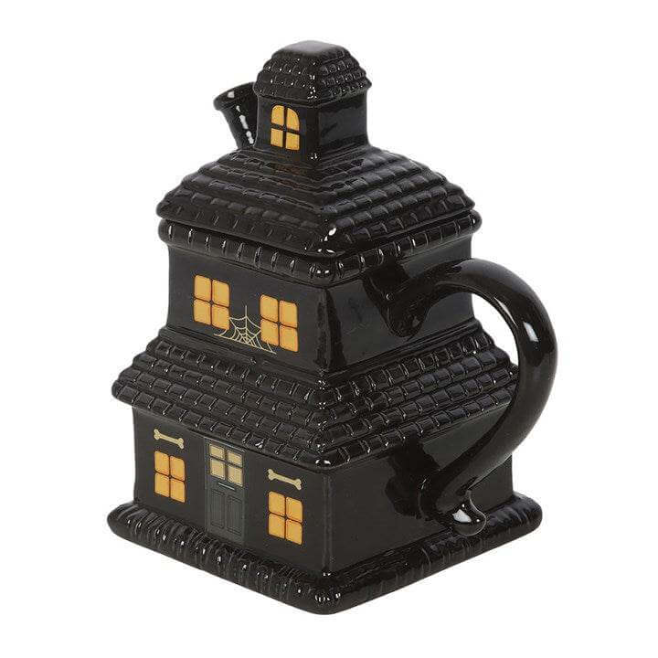 Black Haunted House Mug crafted from ceramic, featuring intricate spooky design for Halloween lovers.