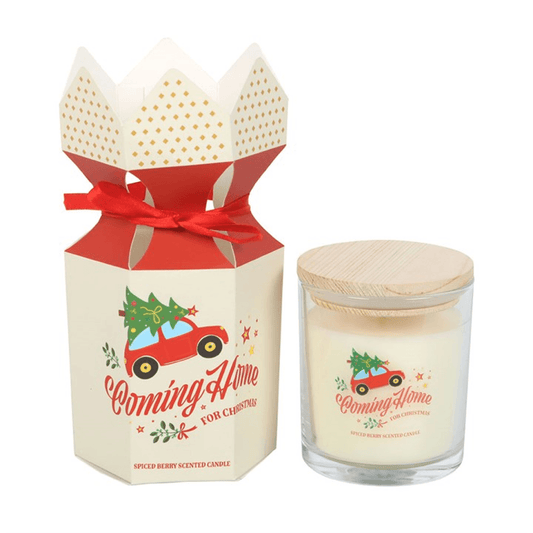 Festively presented Coming Home for Christmas Spiced Berry Candles in decorative packaging.