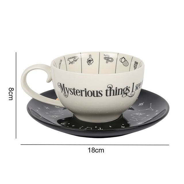 Fortune Telling Ceramic Teacup with Saucer featuring mystical symbols for tea leaf reading.