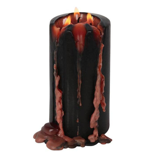 Large Vampire Blood Pillar Candle with bleeding wax effect and flickering flame for eerie ambiance.