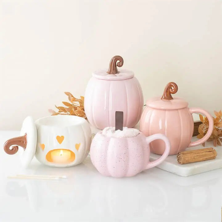 Pink Pumpkin Mug and Socks Set featuring four decorative mugs in pastel colors with pumpkin designs.