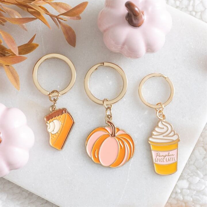 Add a soft and stylish autumn touch to your everyday essentials with this Pretty Pumpkin Keyring. Featuring a charming pumpkin design in delicate pink and orange tones, this accessory brings a subtle seasonal feel that’s both cute and versatile. Perfect f