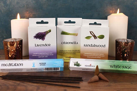 Elements Lavender Incense Cones displayed with other incense options and candles on a wooden surface.