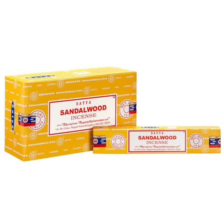 Sandalwood incense packaging with yellow box and red label on a white background