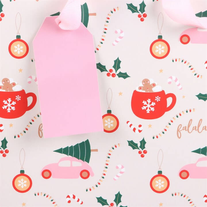 Christmas-themed pattern with pink balloons, red mugs, green trees, and candy canes on a white background.