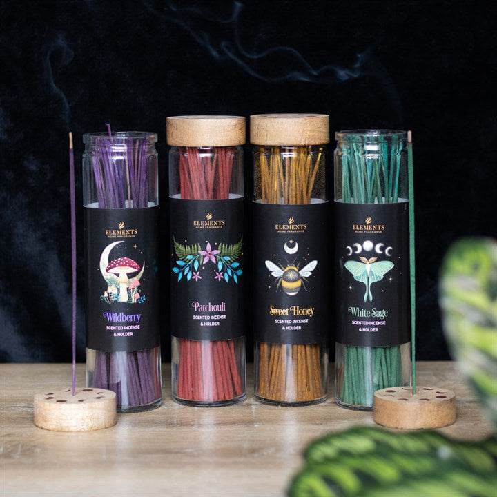 Set of 20 Dark Forest Incense Sticks in glass tubes with fragrances: Wildberry, Patchouli, Sweet Honey, and White Sage.