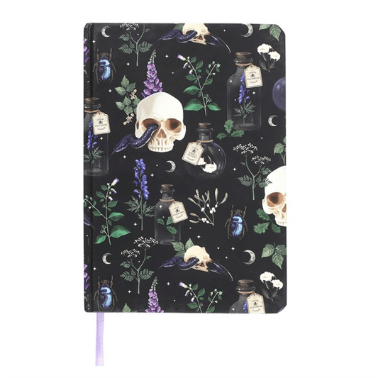 Notebook with skull and potion design on a black background