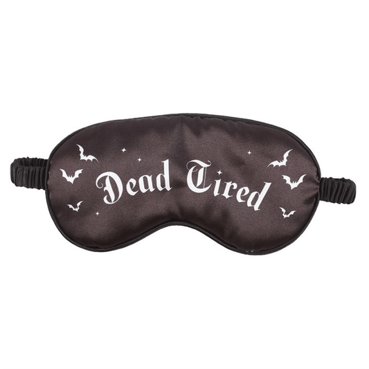 Black sleep mask with 'Dead Tired' text and bat designs on a white background