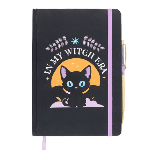 Black notebook with a cat illustration and 'In My Witch Elfh' text on a white background