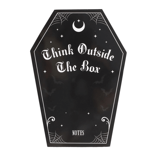 Black coffin-shaped notepad with 'Think Outside The Box' text and spider web design on a white background