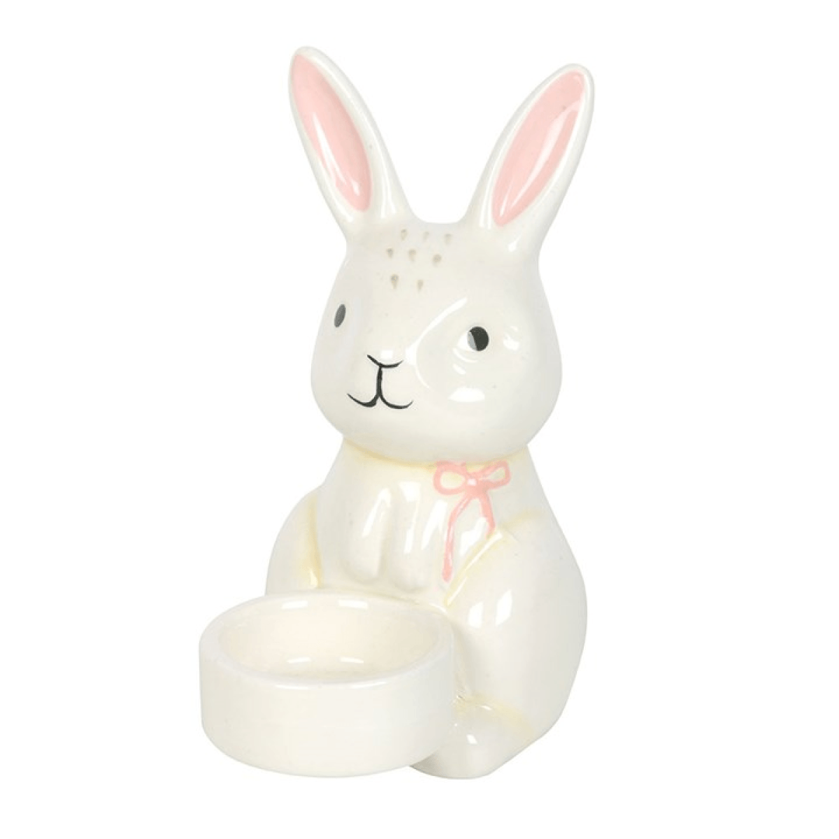 Ceramic rabbit-shaped night light with a pink bow on a white background