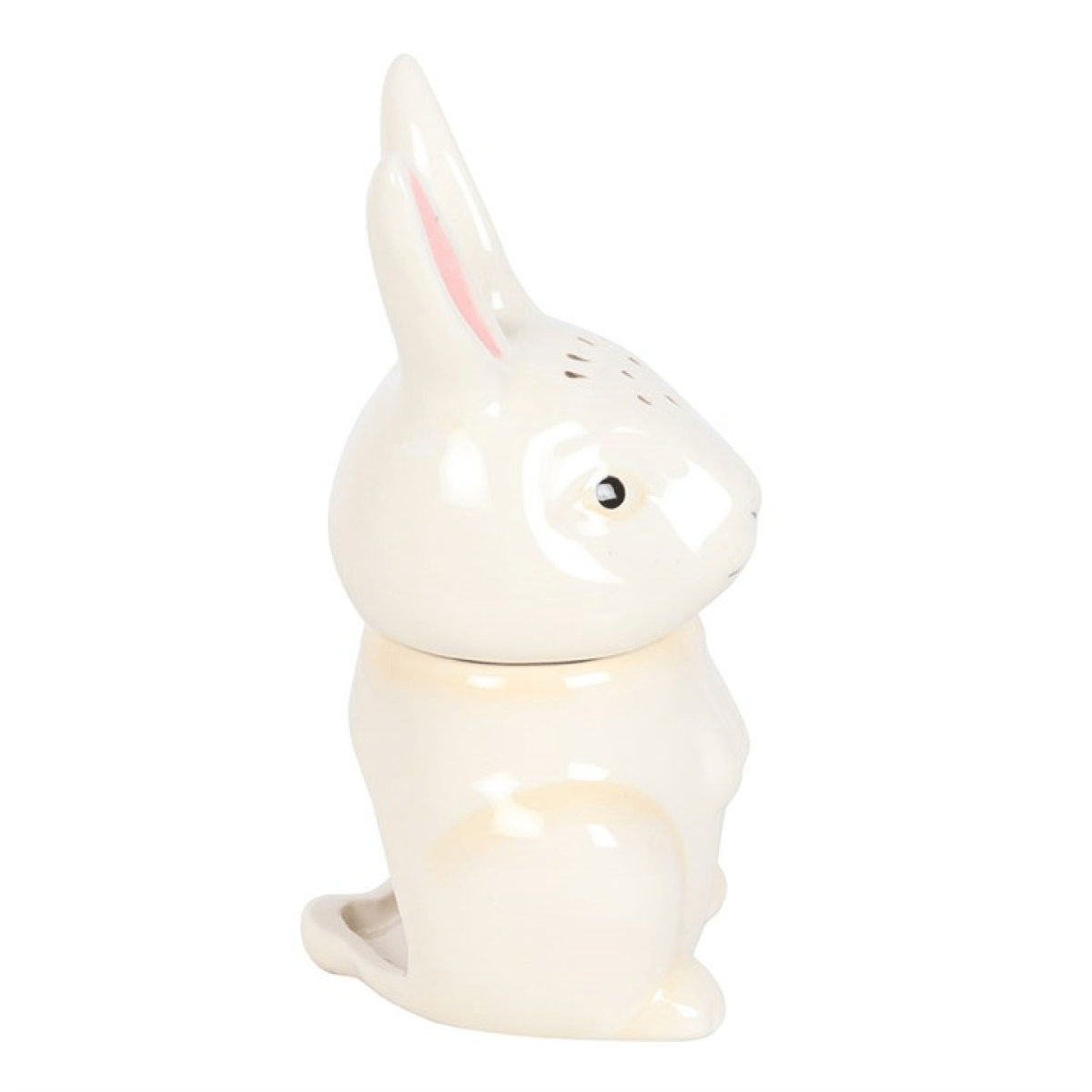 Ceramic rabbit-shaped night light on a white background