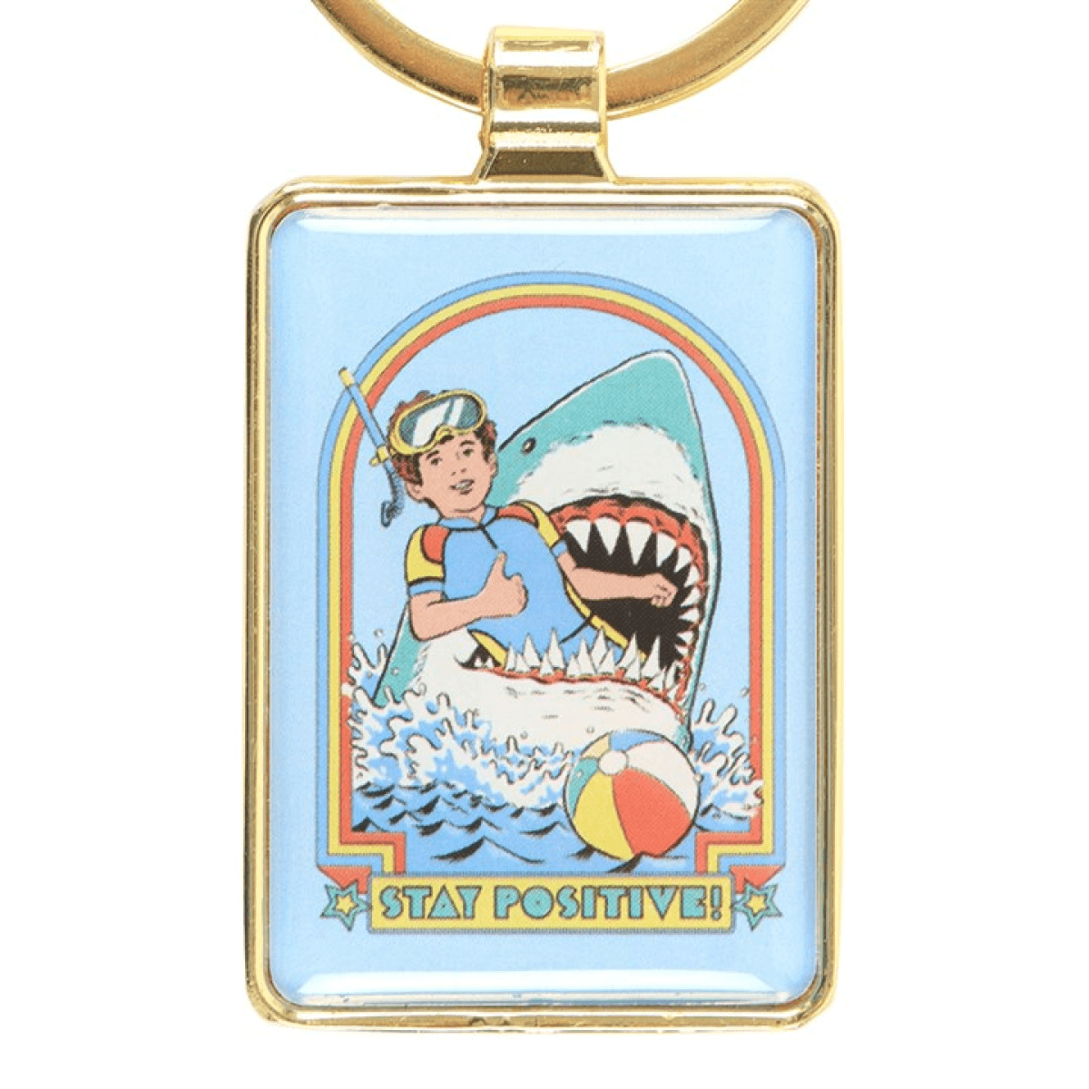 Keychain with a colorful illustration of a boy holding a shark, surrounded by a rainbow, with 'Stay Positive!' text.