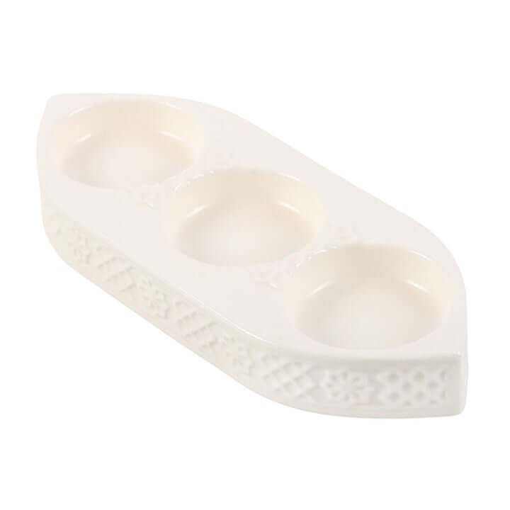 White shoe sole with textured bottom on a white background