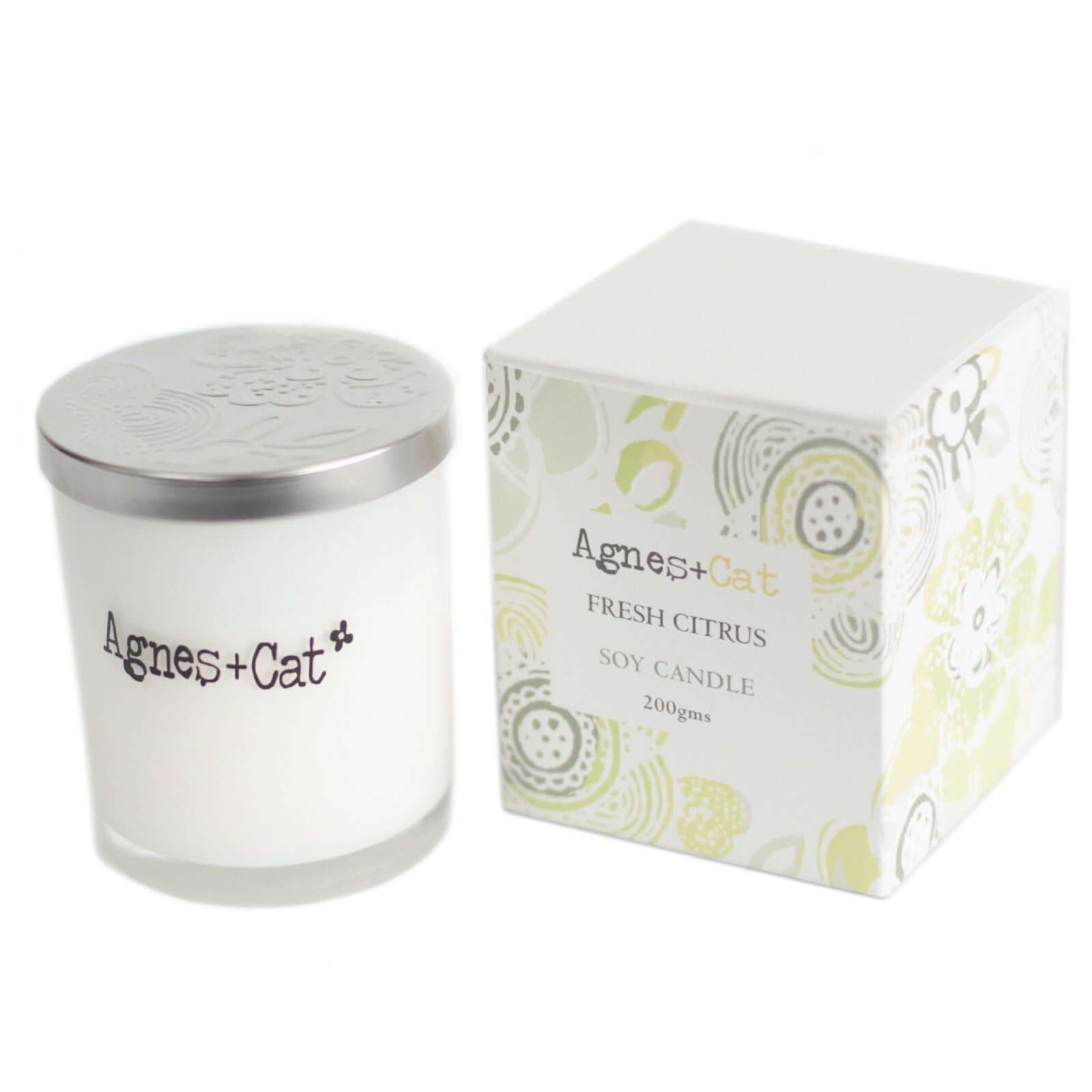 Agnes + Cat votive candle in fresh citrus scent with a decorative box, made from natural soy wax.