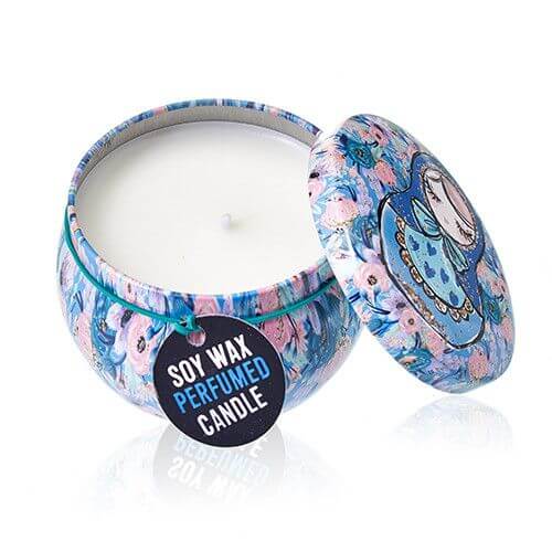 Art Tin Candle featuring a colorful Russian Doll design and made of eco-friendly soy wax.