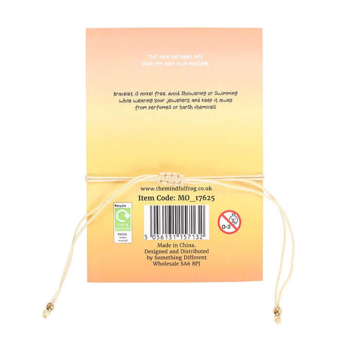 Back packaging of Be Brave Yellow Jade Crystal Moon Bracelet, displaying care instructions and product information.