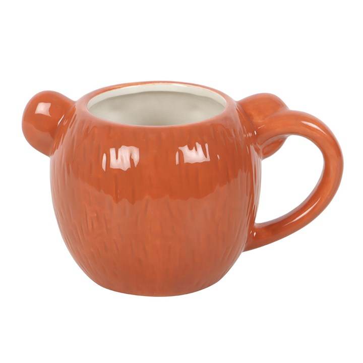 Bear Shaped Mug in orange ceramic, perfect for tea, coffee, or hot chocolate, adds charm to any mug collection.