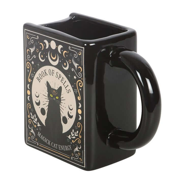Black Cat Magick Book Shaped Mug designed to look like a spell book, perfect for cozy reading sessions.