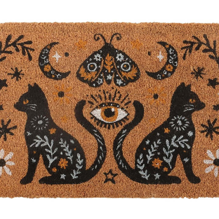 Welcome guests with a touch of mystical charm using the Natural Frightful Folk Cat Doormat. Featuring a bold folk-inspired design, this eye-catching mat showcases two black cats, celestial moons, and a central all-seeing eye—perfect for adding a hint of s