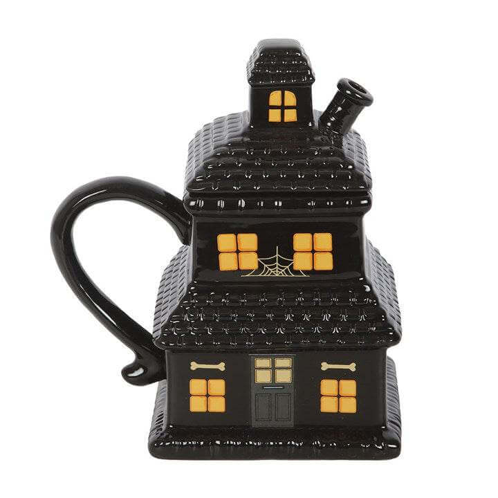 Black Haunted House Mug, spooky ceramic design with intricate details, perfect for Halloween coffee lovers.
