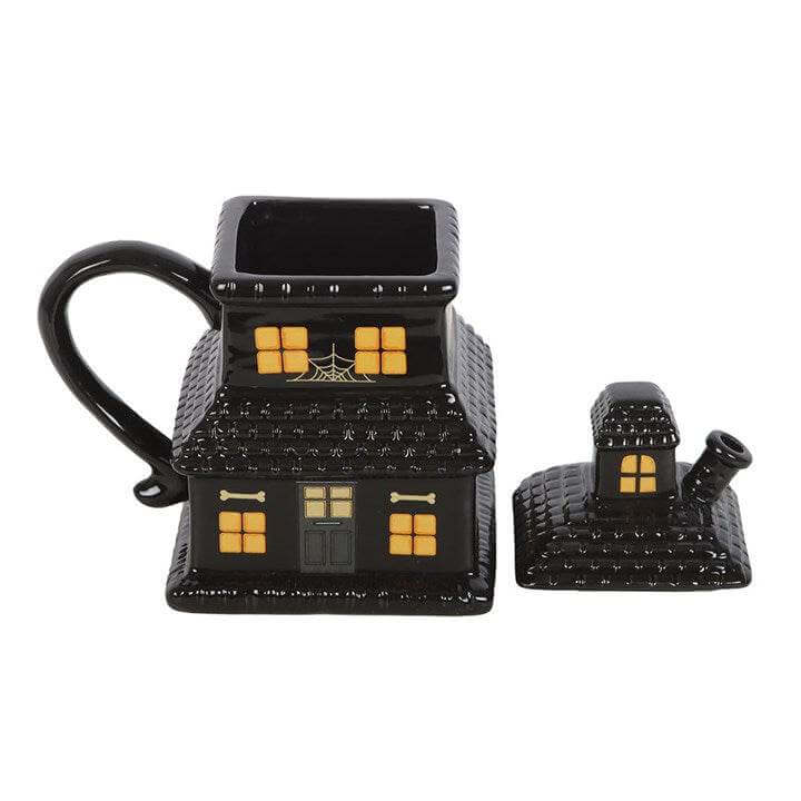 Haunted House Mug in black ceramic design with spooky details for Halloween coffee or tea lovers.