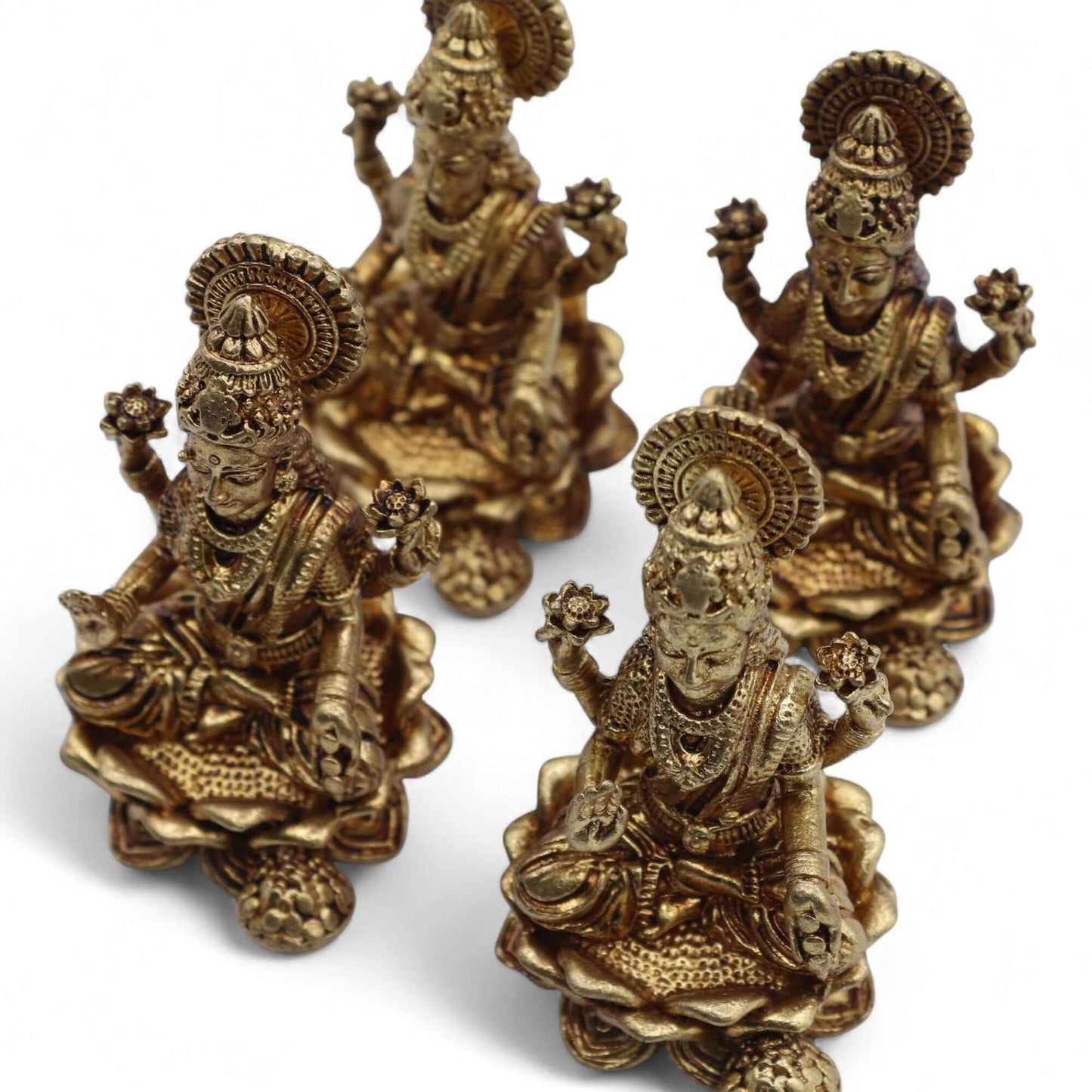 Brass Miniature Gods - Handcrafted Goddess Laxmi statues showcasing exquisite detailing and polished antique finish.