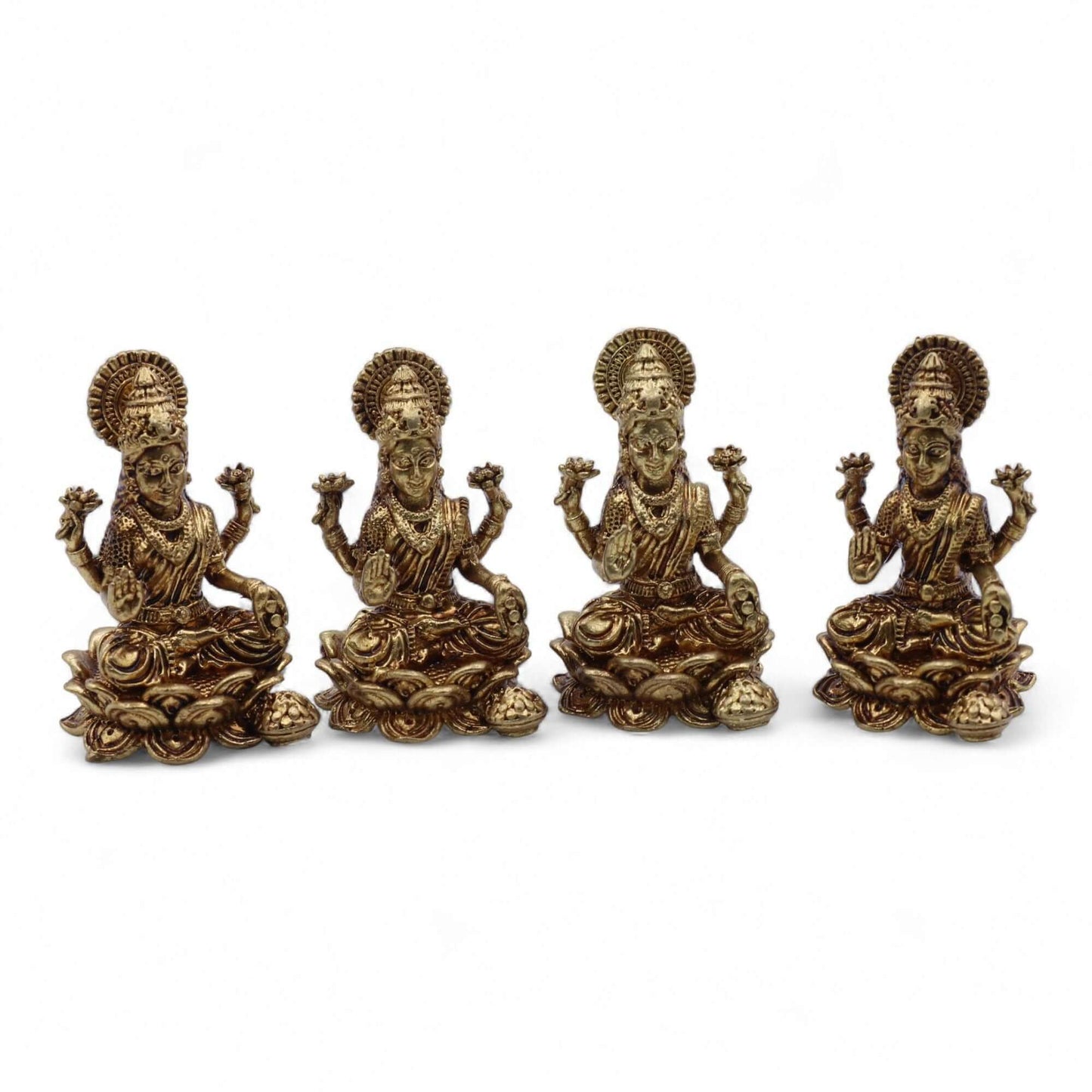 Brass Miniature Gods – Handcrafted brass statues of Goddess Laxmi, showcasing prosperity and abundance.