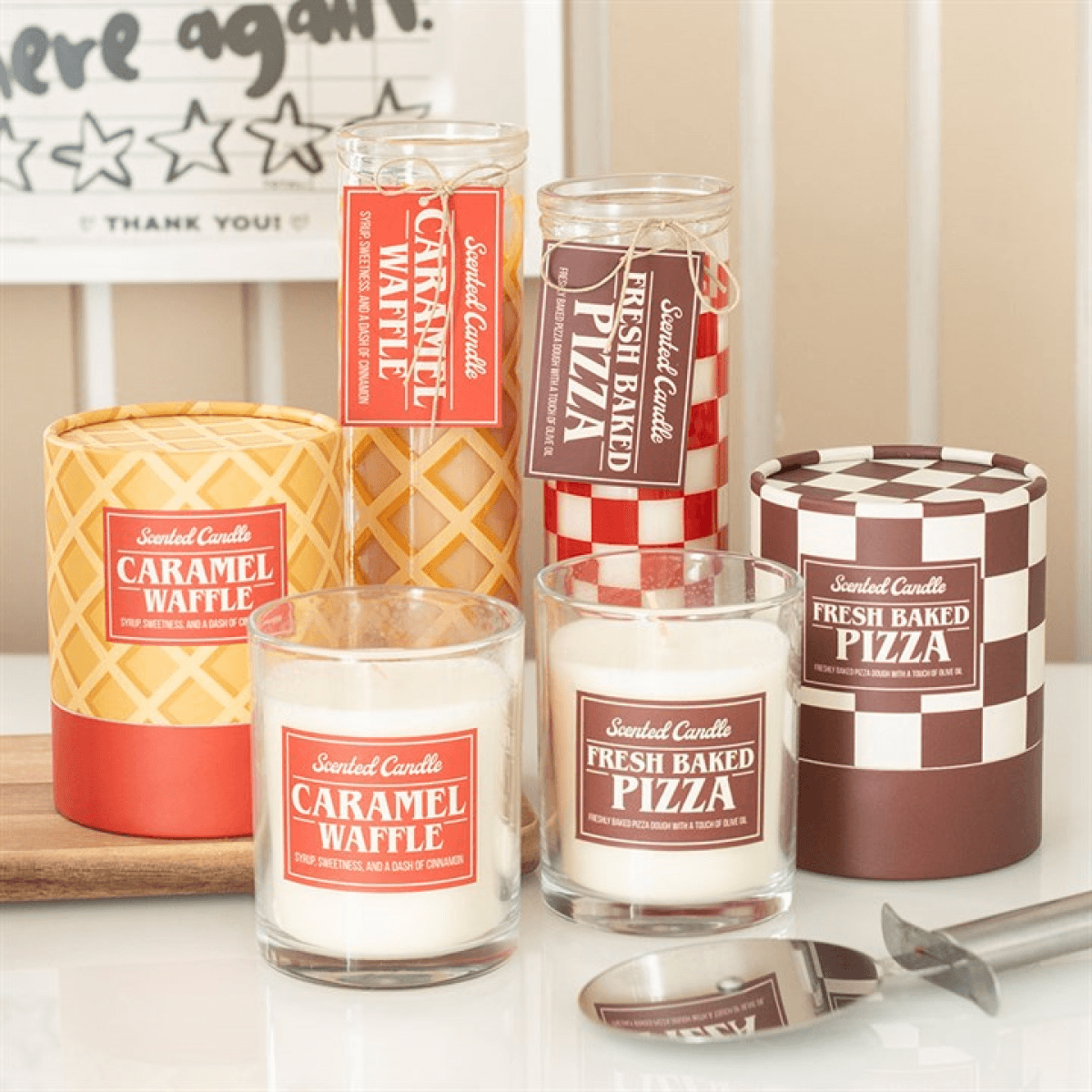 Scented Tube Candles featuring Caramel Waffle and Fresh Baked Pizza designs in stylish glass containers.