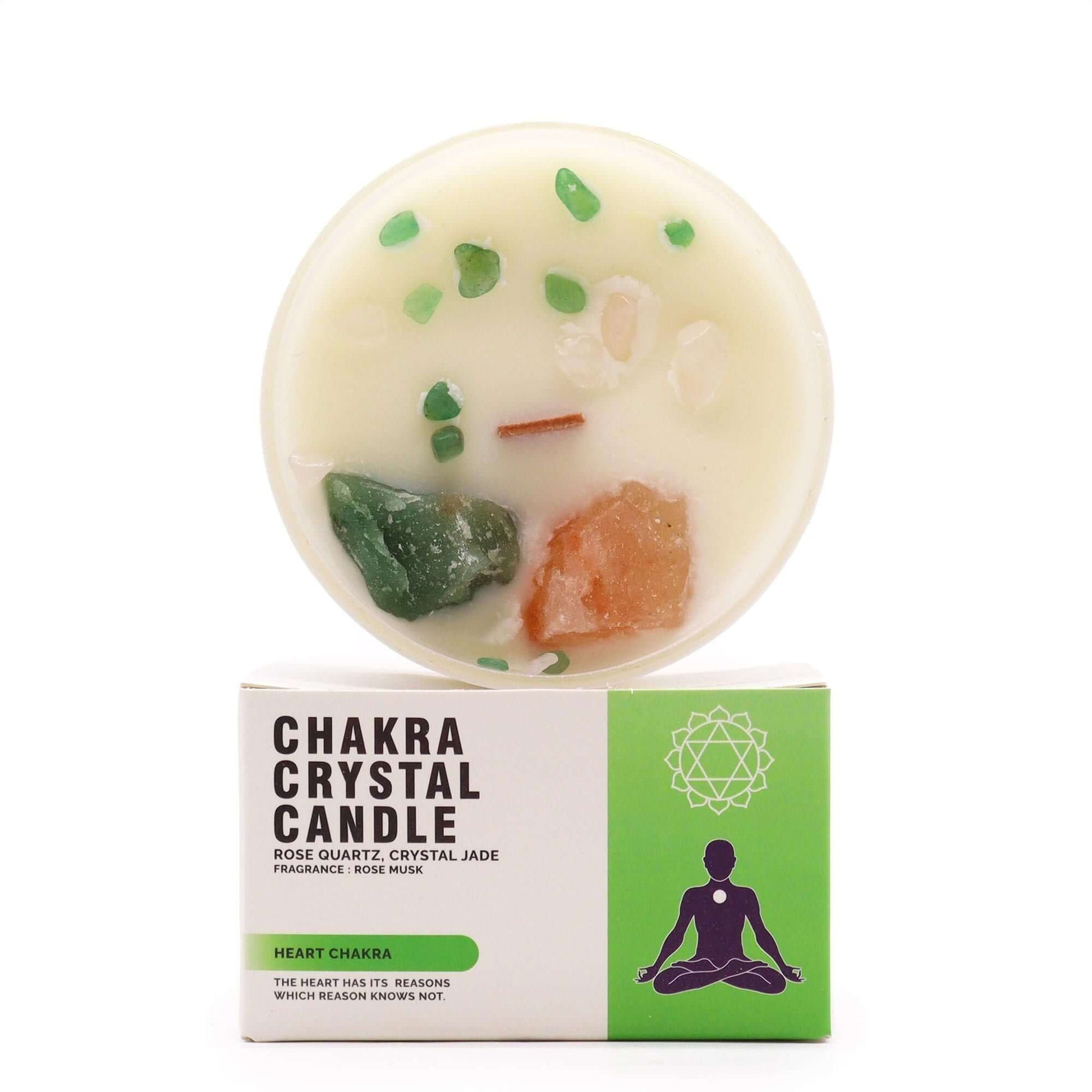 Heart Chakra candle with rose quartz and jade crystals, infused with rose musk fragrance.