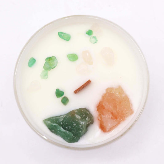 Heart Chakra candle with green crystals and Rose Musk fragrance for love and harmony.