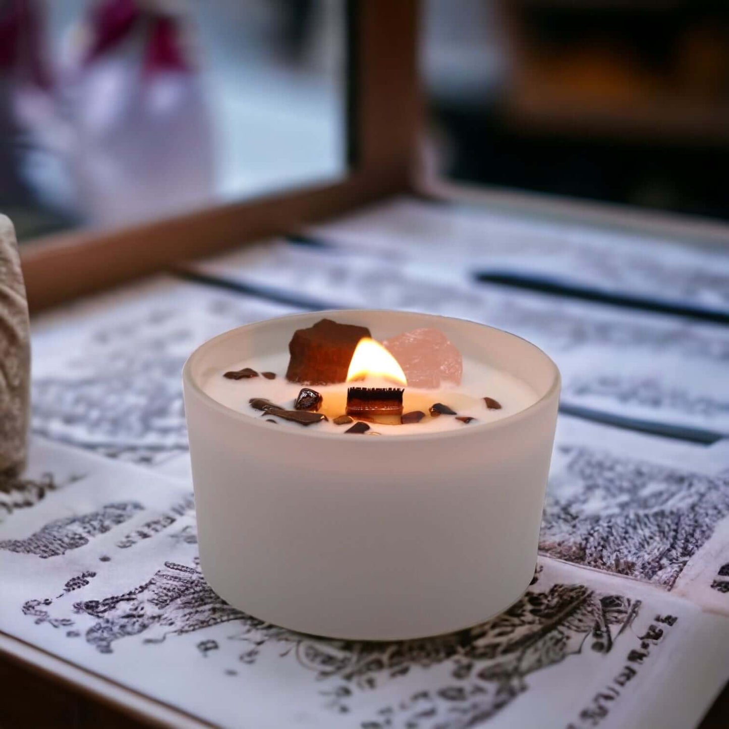 Chakra Crystal Candle - Sacred Chakra burning with crystal on top, symbolizing creativity and passion.