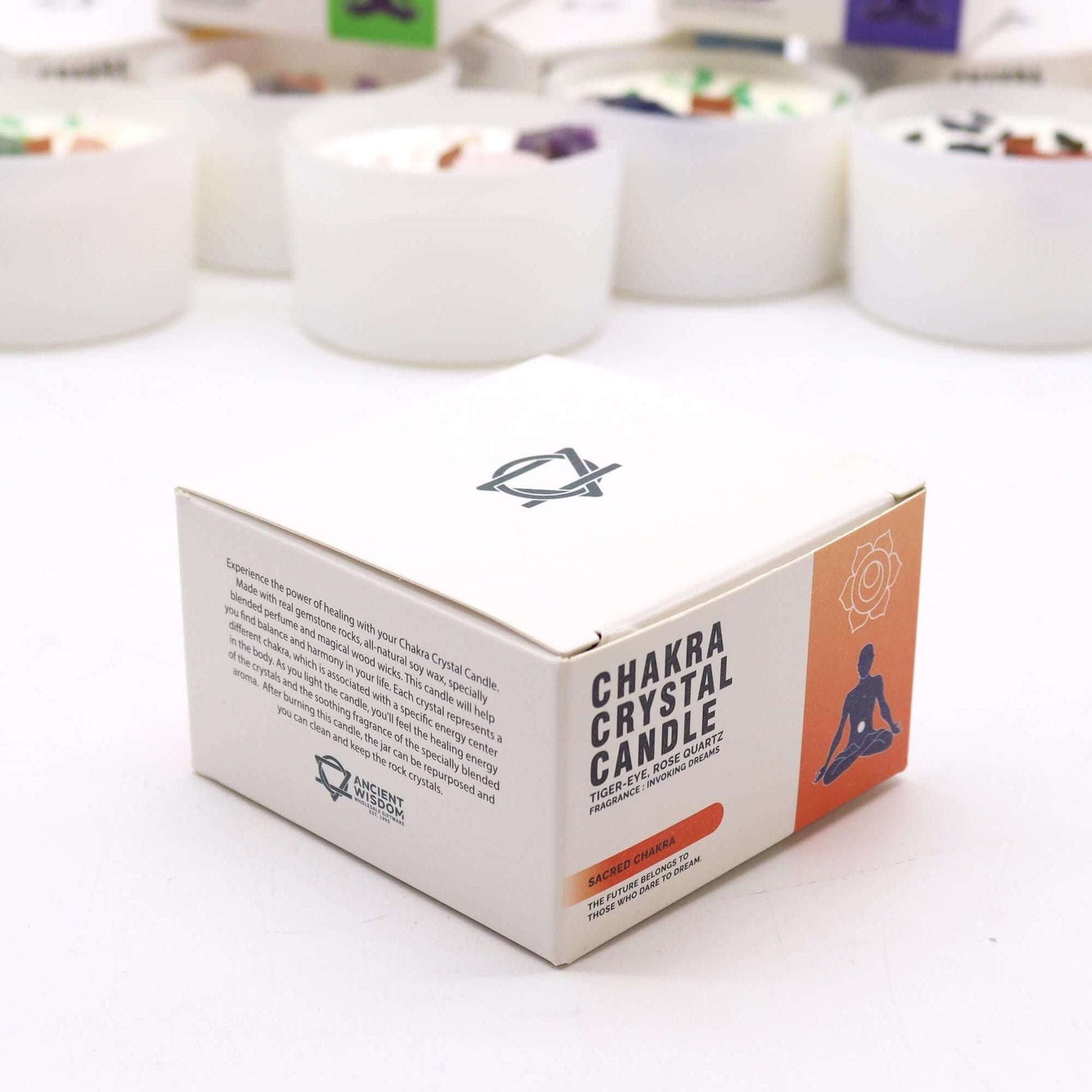 Chakra Crystal Candle packaging for the Sacred Chakra, promoting creativity and passion.