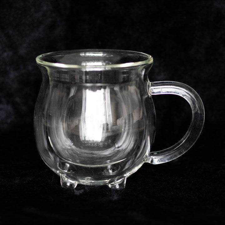 Clear double walled glass cauldron mug with handle ideal for hot or cold beverages.