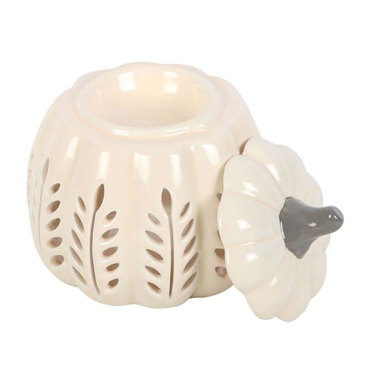 Cream Leaf Cut Out Pumpkin Oil Burner and Wax Warmer with leaf details in soft cream color.