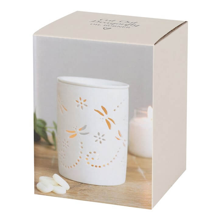 Cut Out Dragonfly Oil Burner displayed in elegant white ceramic with delicate dragonfly cut-out details.